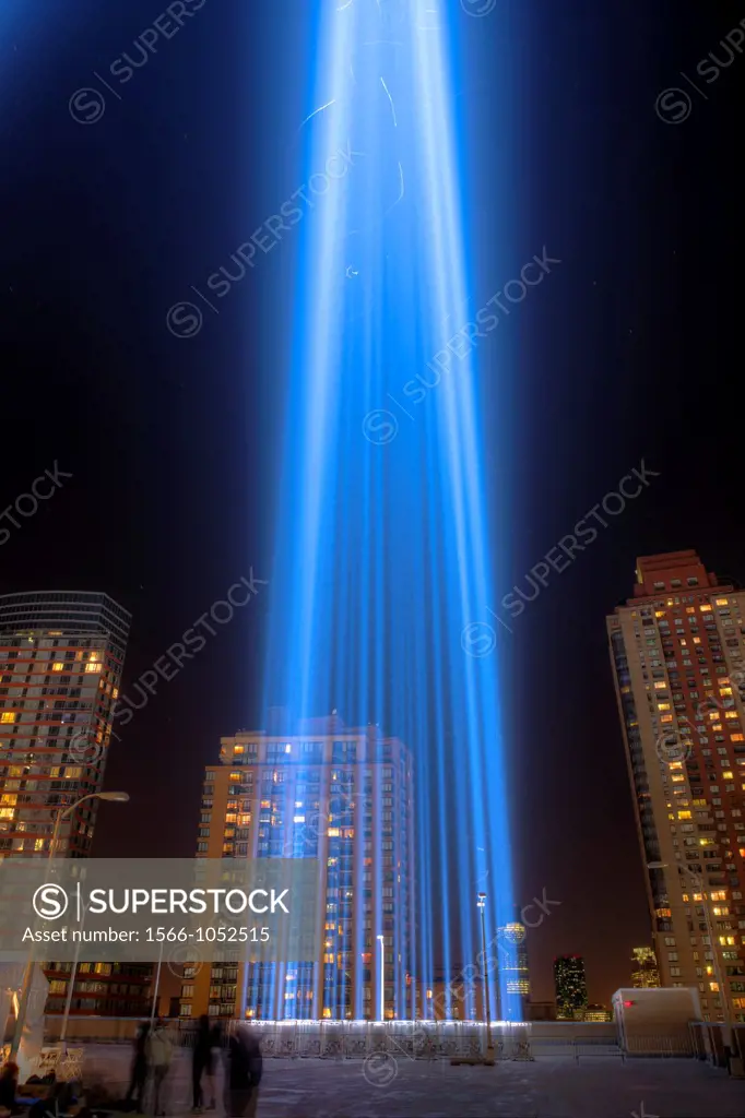 One of the beams of light of the Tribute in Light, an annual memorial to the events of September 11, 2001, shines into the night sky in New York City ...
