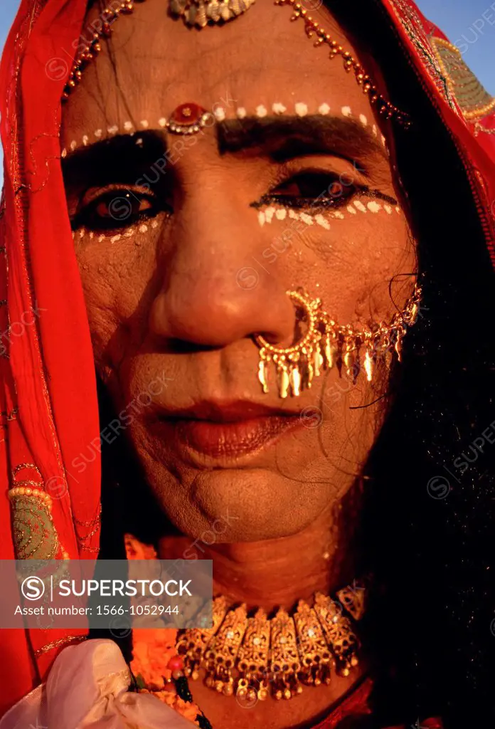 Man dressed and made up like the hindu goddess Durga at the time of the Dussehra festival. Kota, Rajasthan, India.