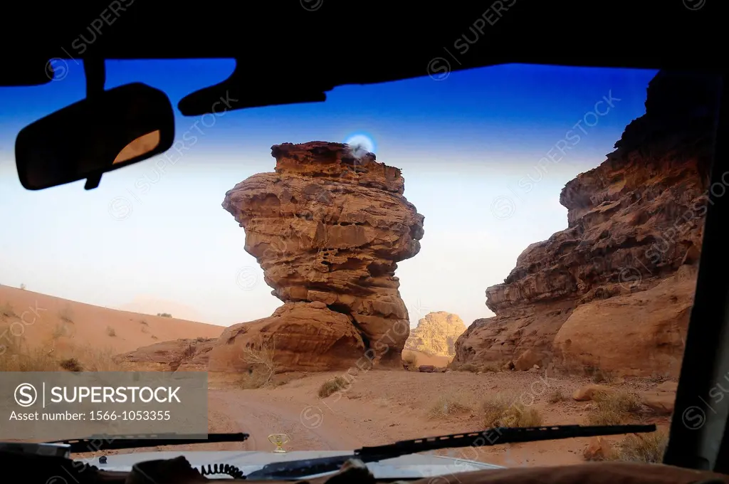 Rock formations from a car front window, Wadi Rum desert, Jordan, Middle East.