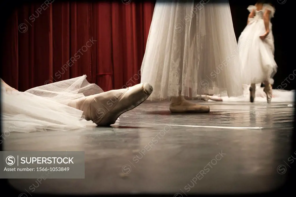 Resting during a classical ballet performance in theater,