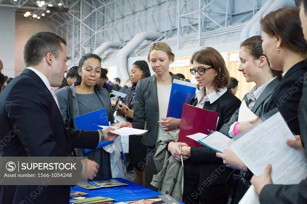 Job seekers attend the CUNY Big Apple Job Fair at the Jacob Javits Convention Center in New York