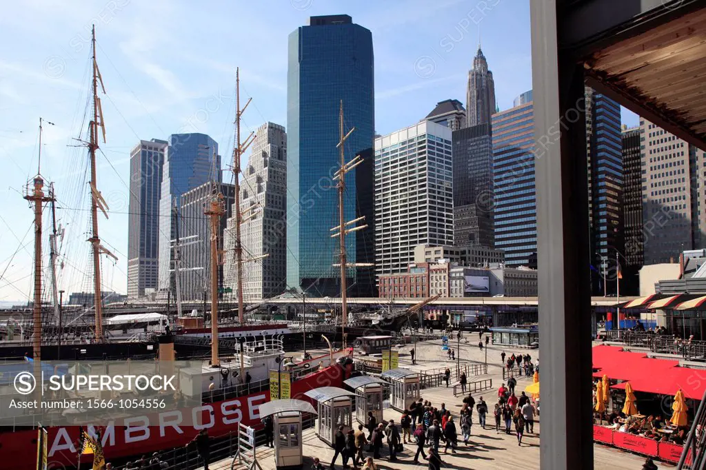 The view of South Street Seaport with the high-rise office towers of Financial District in the background  New York City  New York  USA.