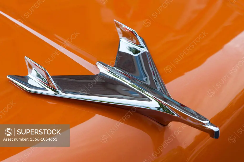The streamlined style airplane hood ornament on a 1956 Chevy Bel Air