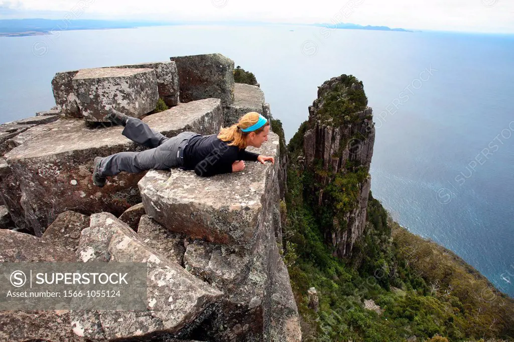 Walker on top of Bishop and Clerk 620 m  Maria Island, Tasmania, Australia
