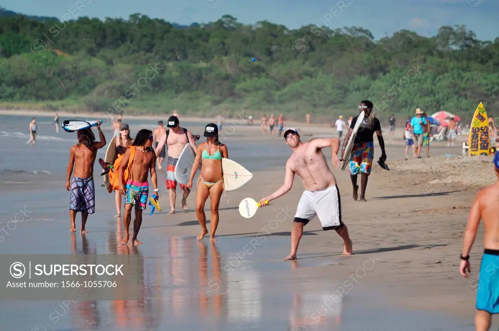 Playa Tamarindo Costa Rica: tourists at the beach  