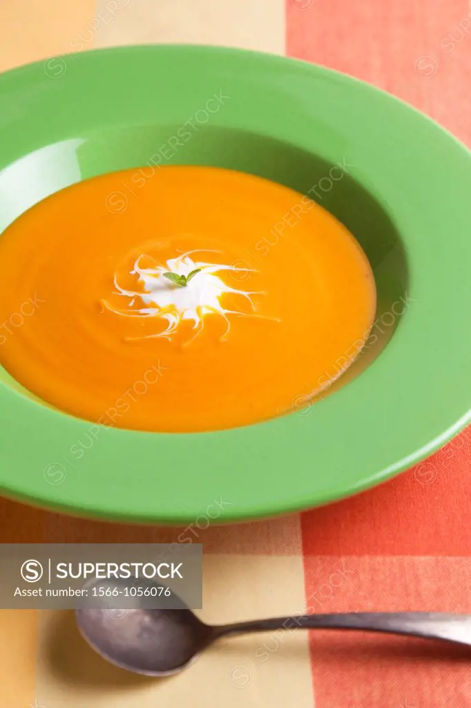 Carrot soup with spoon