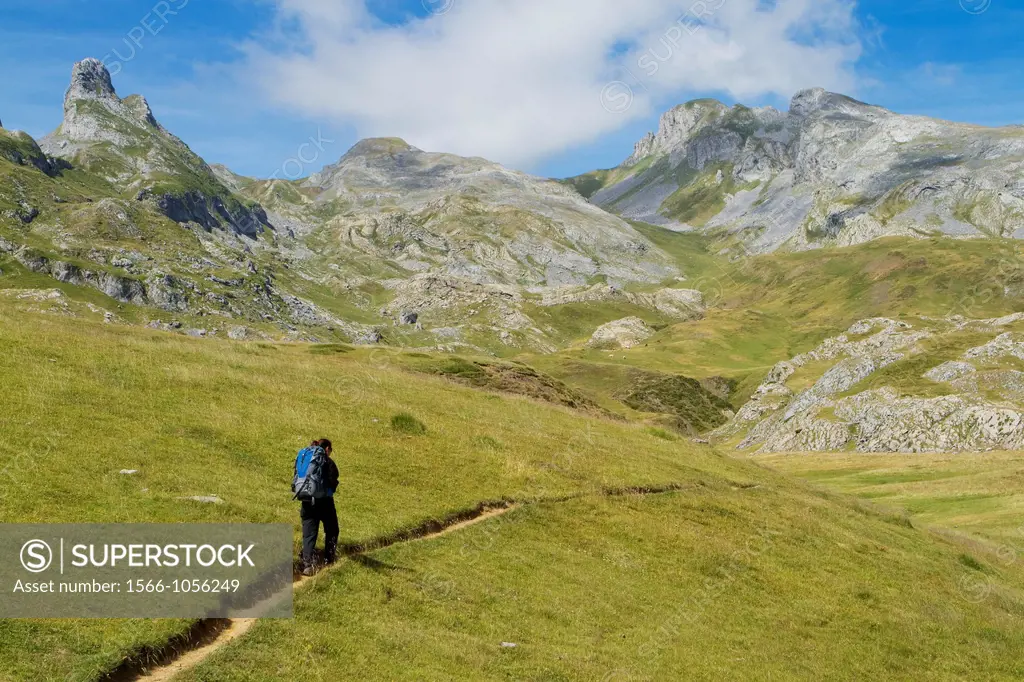Mountaineer walking near Midi D´Ossau peak, in National Park des Pyrenees, in Bearn province  Atlantics Pyrenees  Aquitania, France  Europe