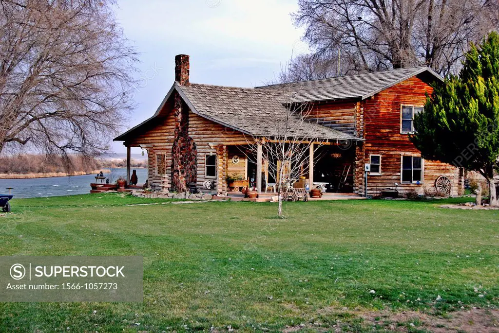 Log cabin home on the Collet farm next to the Snake River near Grand View, Idaho