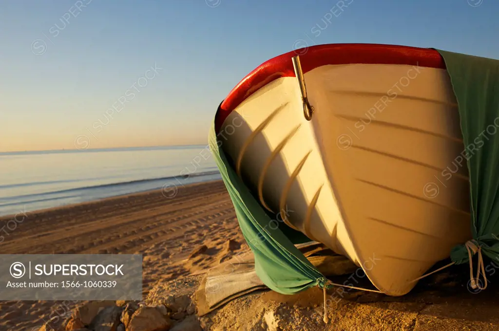 small boat at Santa Pola beach, Salinas de Santa Pola Nature Reserve, Santa Pola, Alicante, Spain