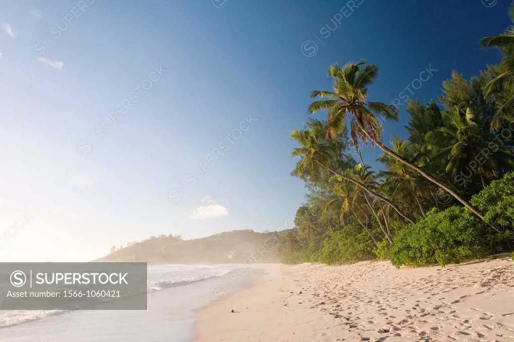 Anse Intendance late in the afternoon with mist caused by the waves crushing on the shore - Mahe´ Island - Seychelles