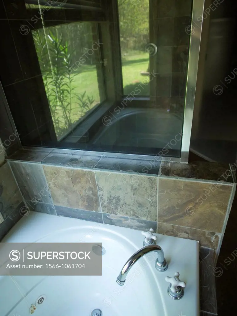 A tiled kitchen sink is empty and vacuous inside a foreclosed home in Covington, Louisiana, Uniited States