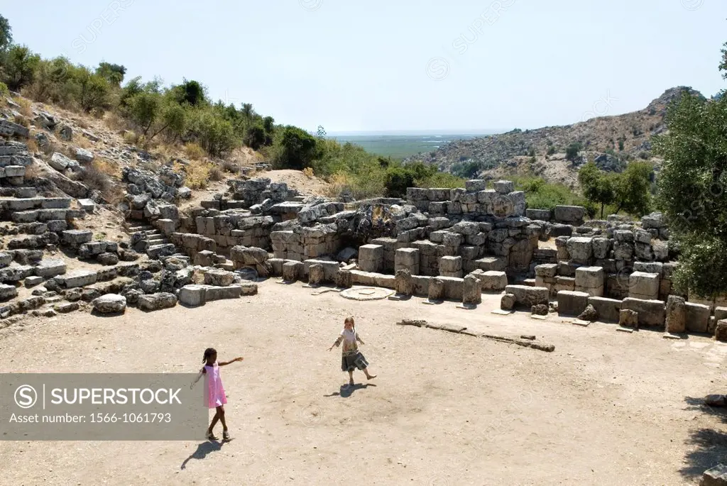 little girls playing at the Caunos archeological site, Dalyan, Turkey, Eurasia