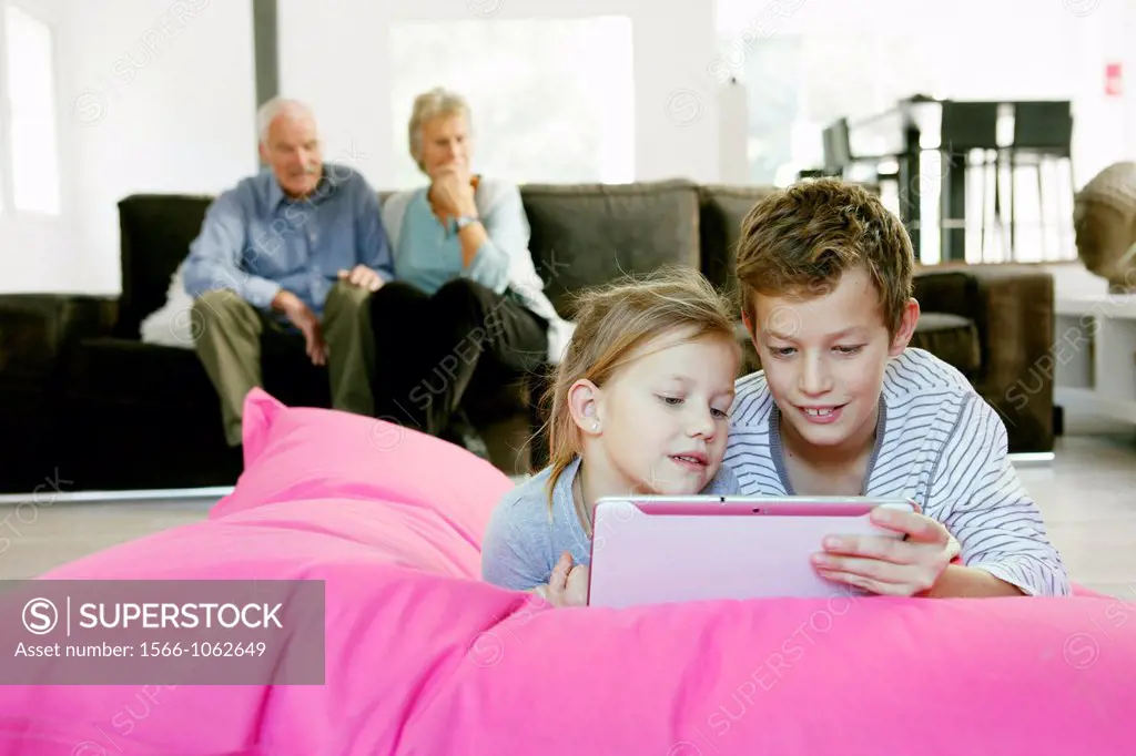 Children using tablet computer