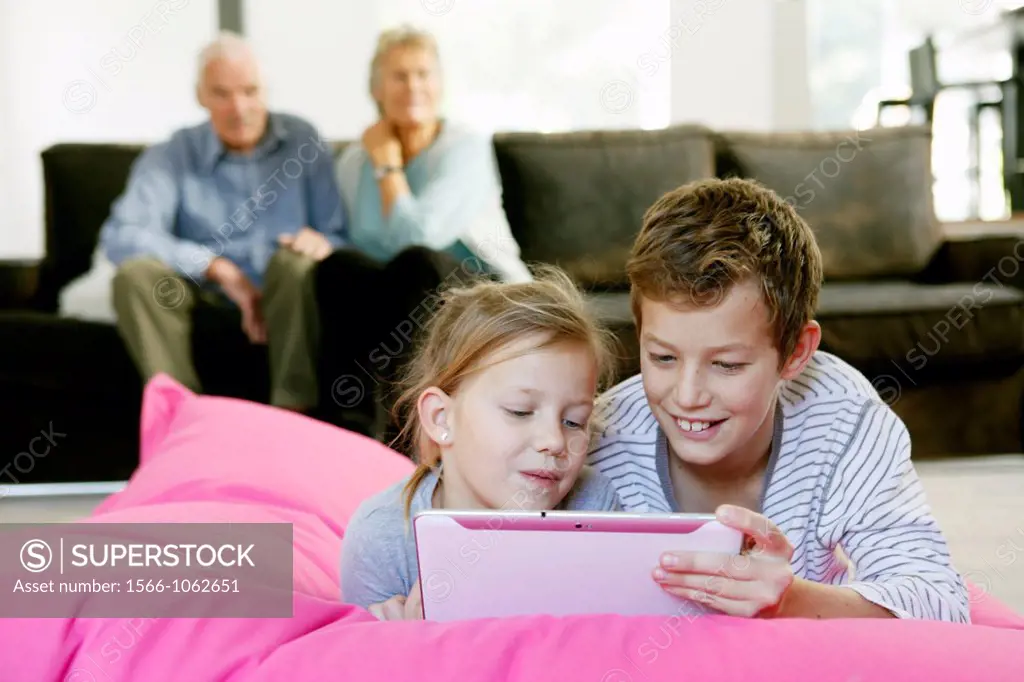 Children using tablet computer