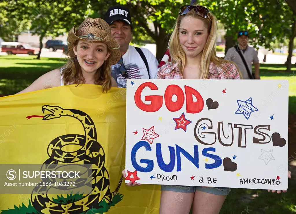 Lansing, Michigan - Gun rights advocates, many of them carrying firearms, rally at the state capitol to oppose a bill to repeal Michigan ´stand your g...