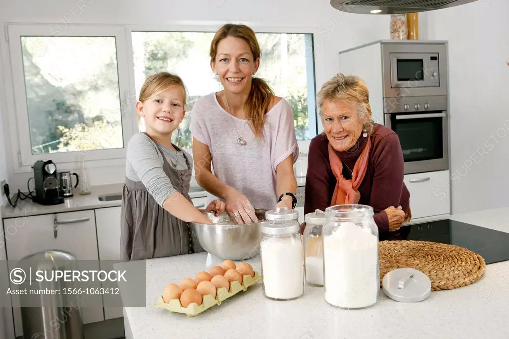 Three generations of women in the kitchen