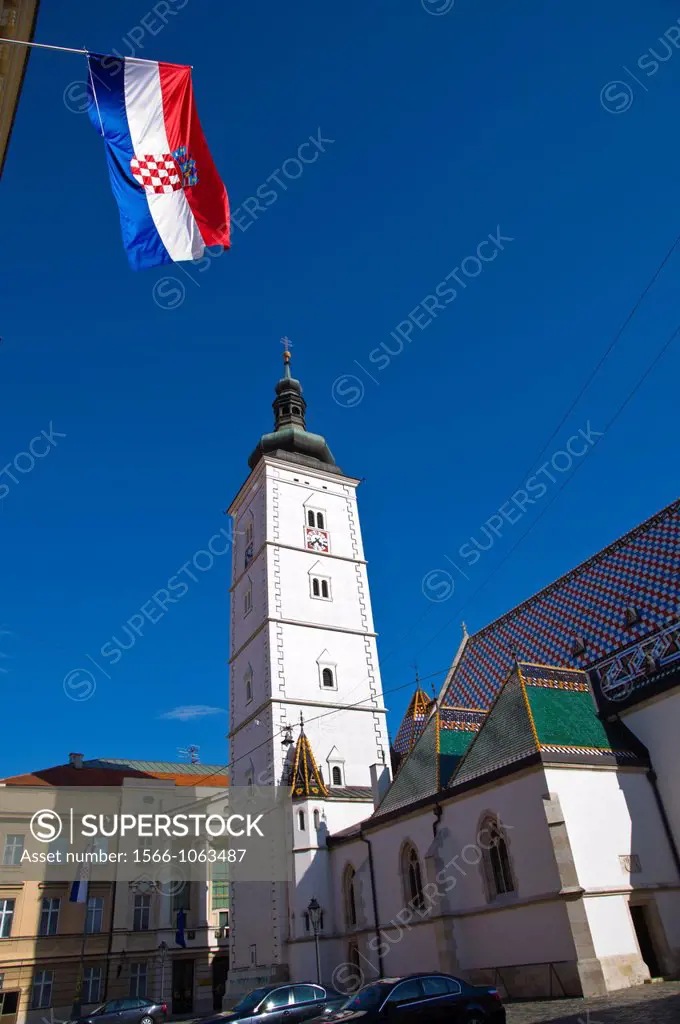Croatian national flag and Crkva svetog Marka the St Mark´s Church at Markov trg square Gradec the old town Zagreb Croatia Europe