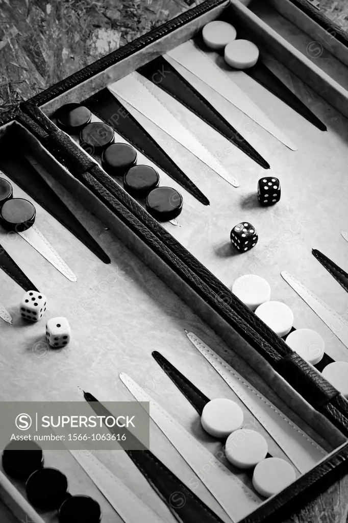 Backgammon game with playing pieces and dice