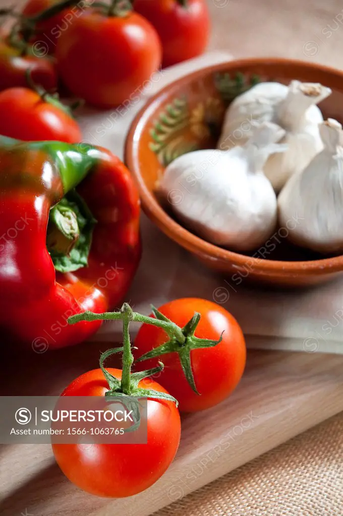 Tomatoes, garlics and pepper. Still life.