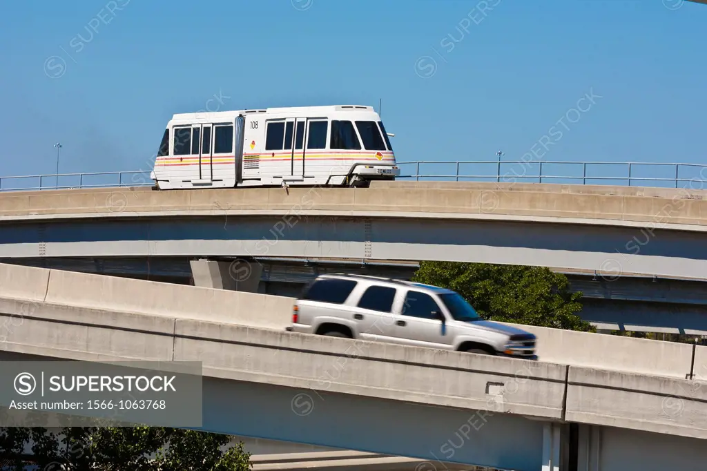 JTA Skyway automated train moves over the Acosta Bridge over the St  Johns River in downtown Jacksonville, FL