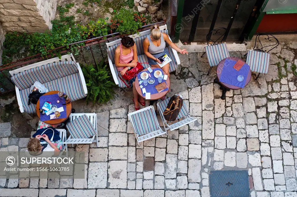 Tourists outside a bar, Split, region of Dalmatia, Croatia, Europe