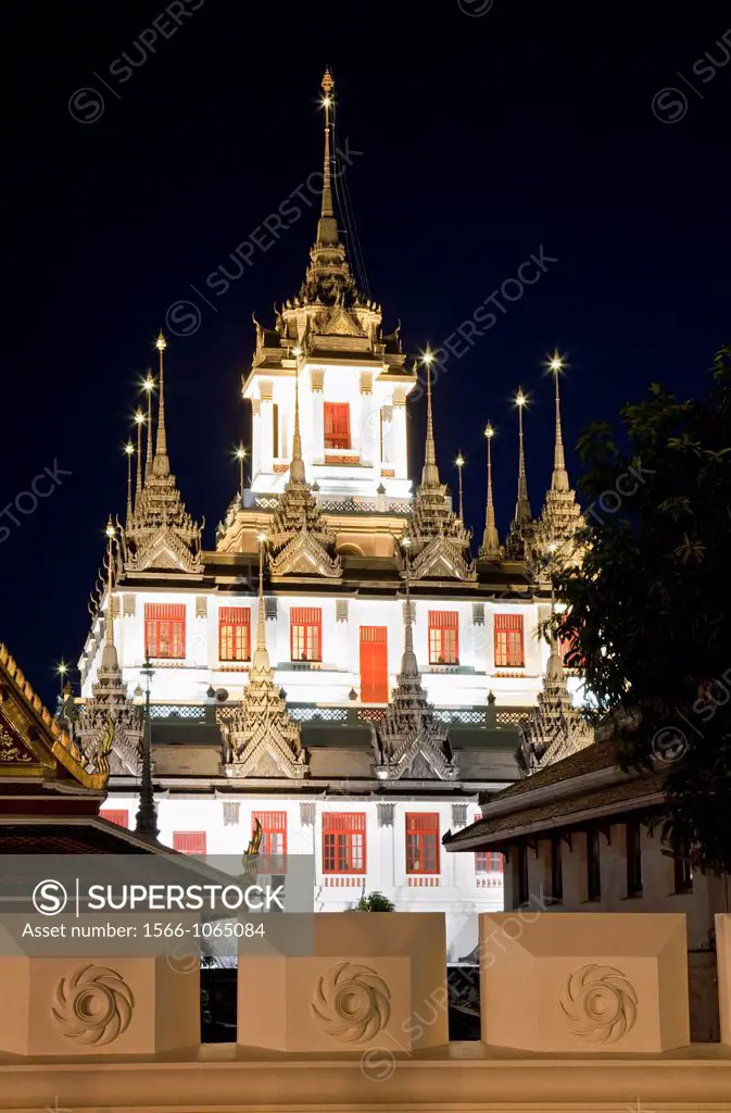 The Loha Prasat Metal Castle at Wat Ratchanadda by night, Banglamphu, Bangkok, Thailand