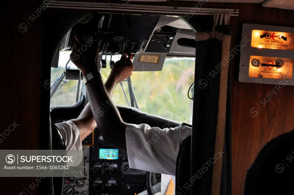 San Blás Panama: Air Panama pilots getting ready for take off at the airfield of Playon Chico, village of Kuna Yala