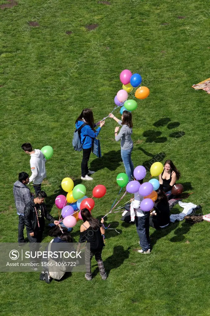 People with colorful balloons  Parc de l´Escorxador, Barcelona  Catalonia, Spain