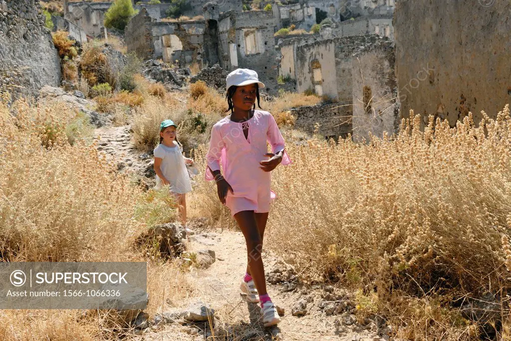 little girls in Kayakoy which was a Greek speaking village, it was abandonned after a population exchange agreement was signed by the Turkish and Gree...