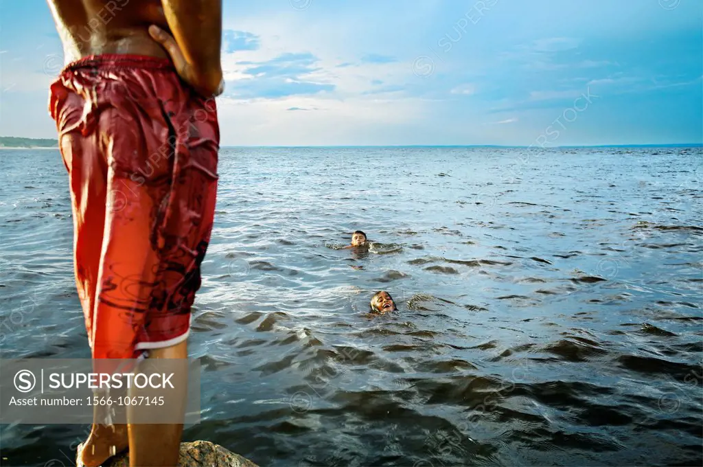 Children swimming, Manaus  Rio Negro Black River, Amazonas state, the Amazon, Brazil.