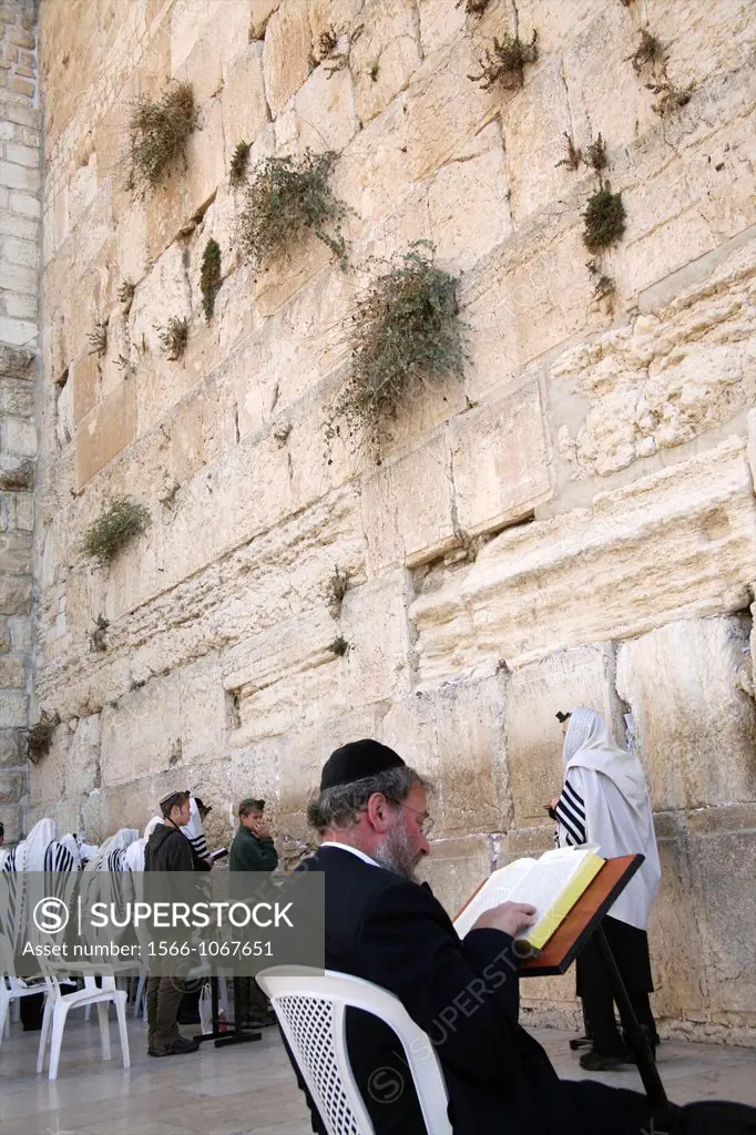 Jewish men gathered at the Western wailing wall in Jerusalem