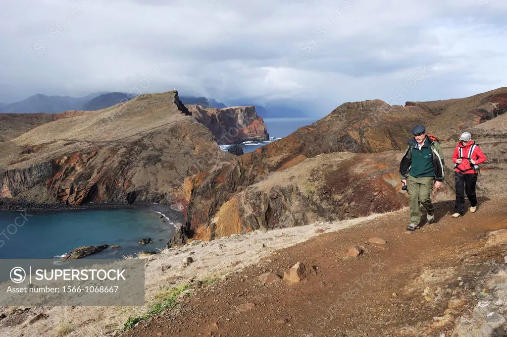 walkers along the Abra bay, Sao Lourenco peninsula, Madeira island, Atlantic Ocean, Portugal