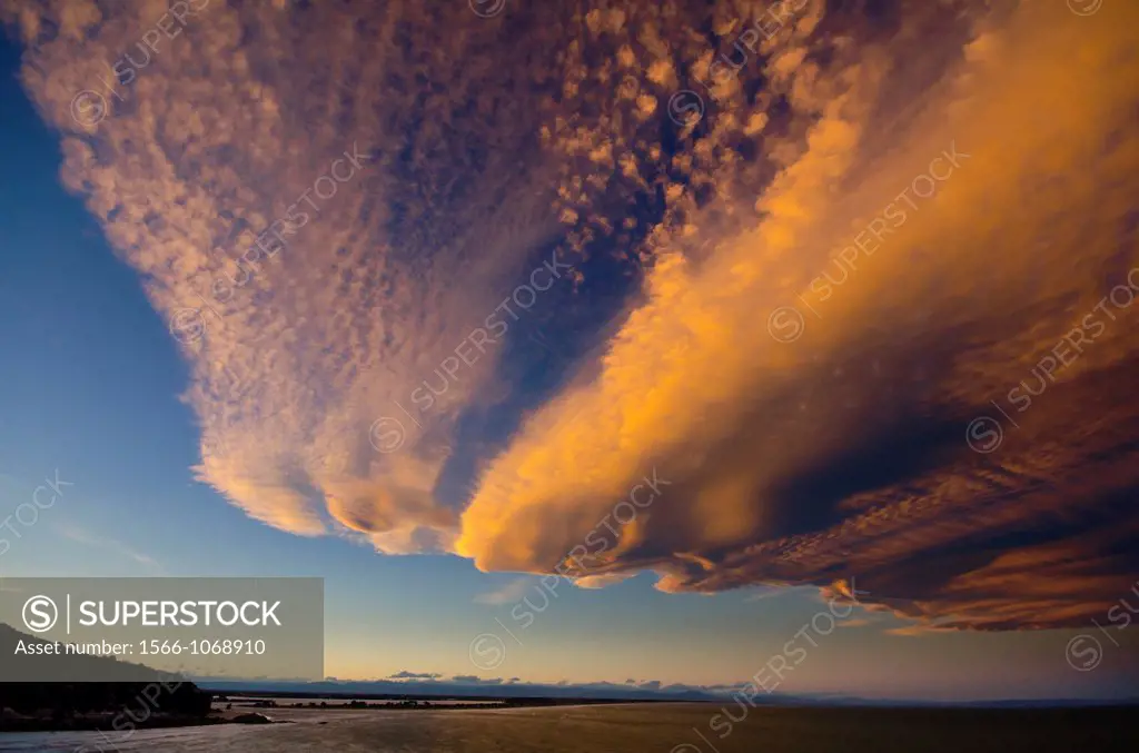 Nor-west cloud formations at sunset, over Sumner and New Brighton beaches, Christchurch, New Zealand