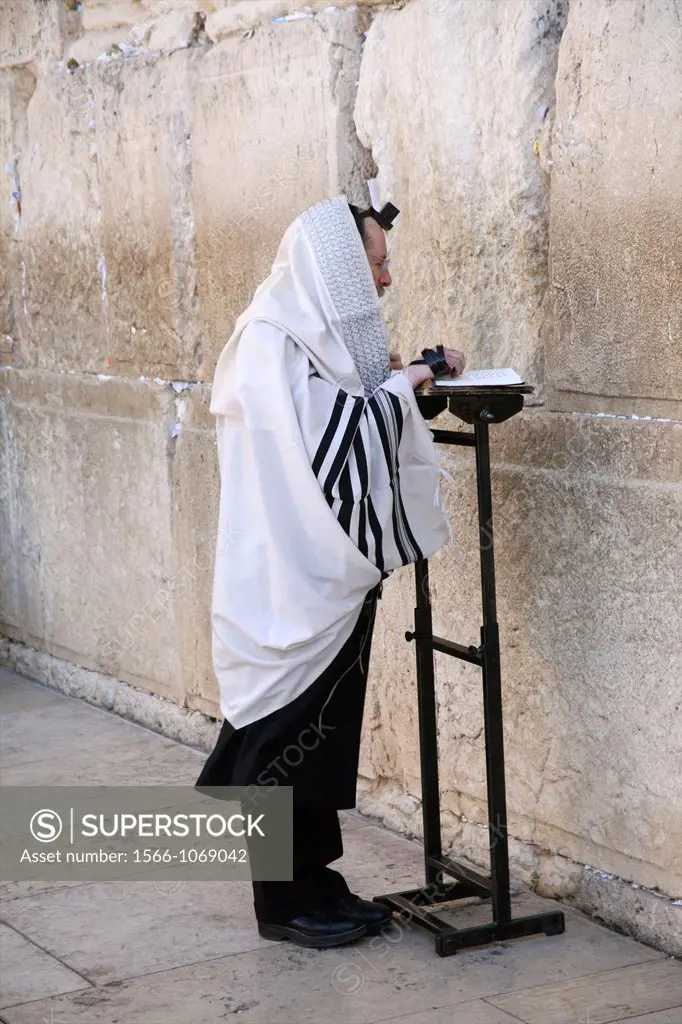 A man prays at the Western wailing wall in Jerusalem