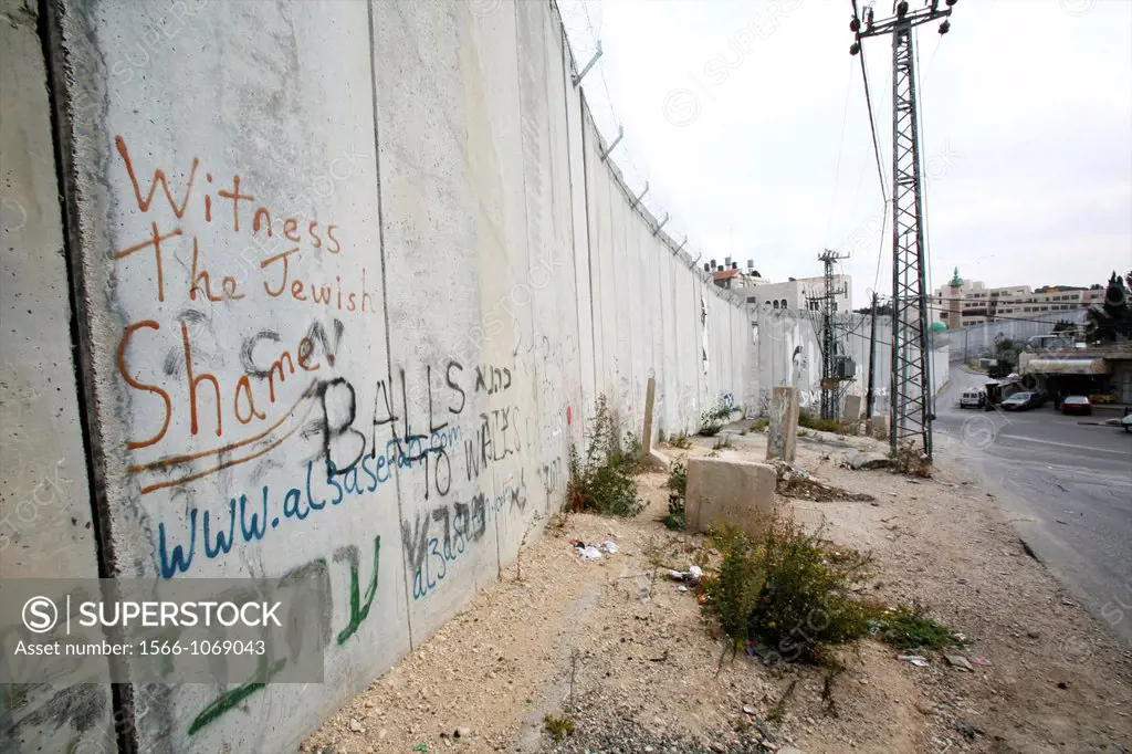 Grafitti protesting the wall that Israel is building around the west bank territories, blocking access for Palestinians who feel imprisoned by it