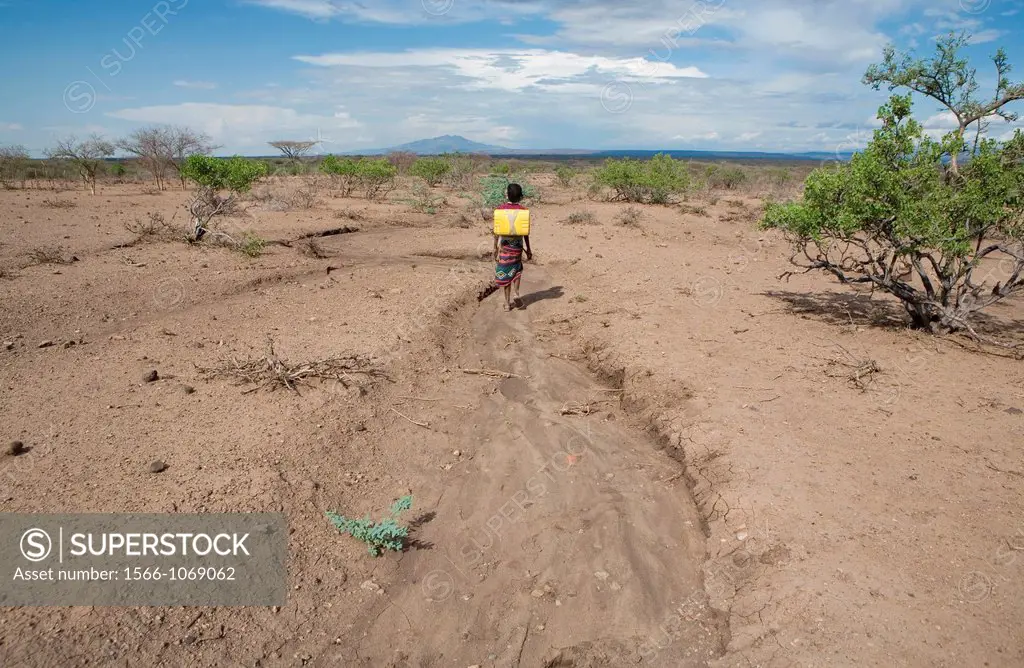 Ethiopian girl fetches drinking water for her family Due to drought, children have to walk for more then one hour before they reach a well which is no...