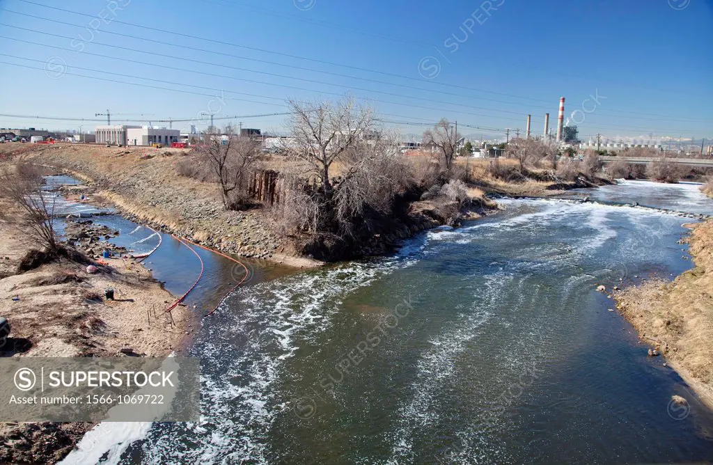 Commerce City, Colorado - Continment booms cross Sand Creek just above its confluence with the South Platte River at the Suncor Energy refinery  Cance...