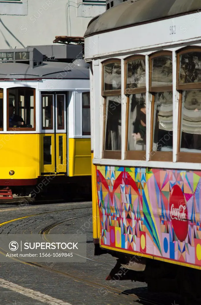 Tram cross Alfama district, Lisbon, Portugal