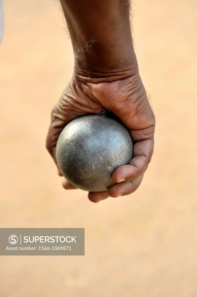 Close-up of bowls ball in players hand in Puducherry Pondichery,Tamil Nadu,South India,Asia