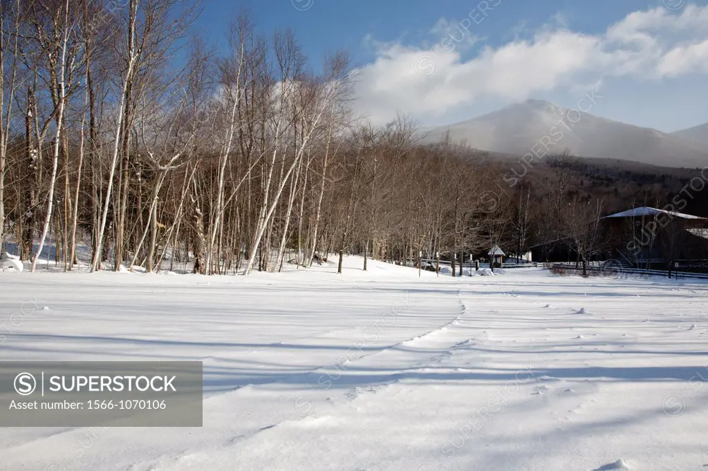 Franconia Notch State Park - Flume Visitor Center during the winter months in the White Mountains, New Hampshire USA  Off in the distance strong winds...