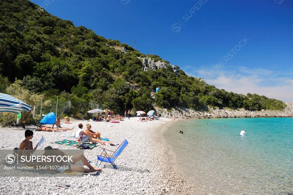 People resting on Divna beach, Peljesac peninsula, Croatia