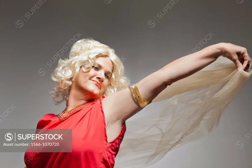 Mature woman dressed up as Greek godess