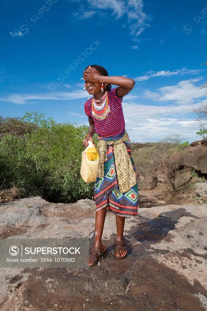 Ethiopian girl fetches drinking water for her family Due to drought, children have to walk for more then one hour before they reach a well which is no...