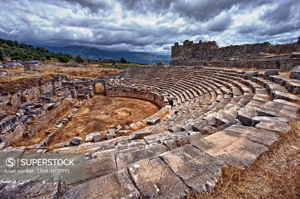 Ampitheatre of Xanthos that has been modified by the Romans with a wall around what would have been the stage to make a pit for Gladitorial & animal e...