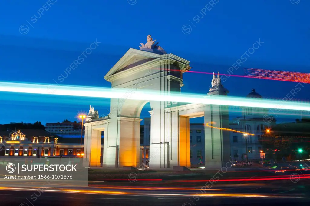 San Vicente Gate and light trails, night view  Madrid, Spain 
