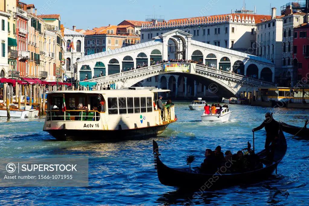 Grand Canal, gondola and Rialto Bridge  Venice, Italy