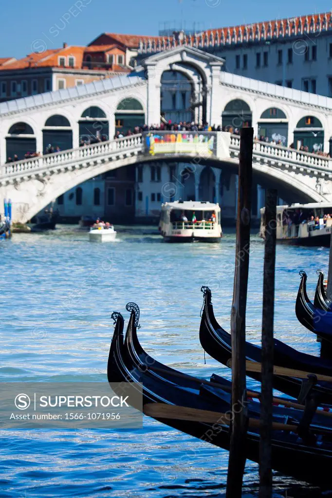 Grand Canal, gondola and Rialto Bridge  Venice, Italy