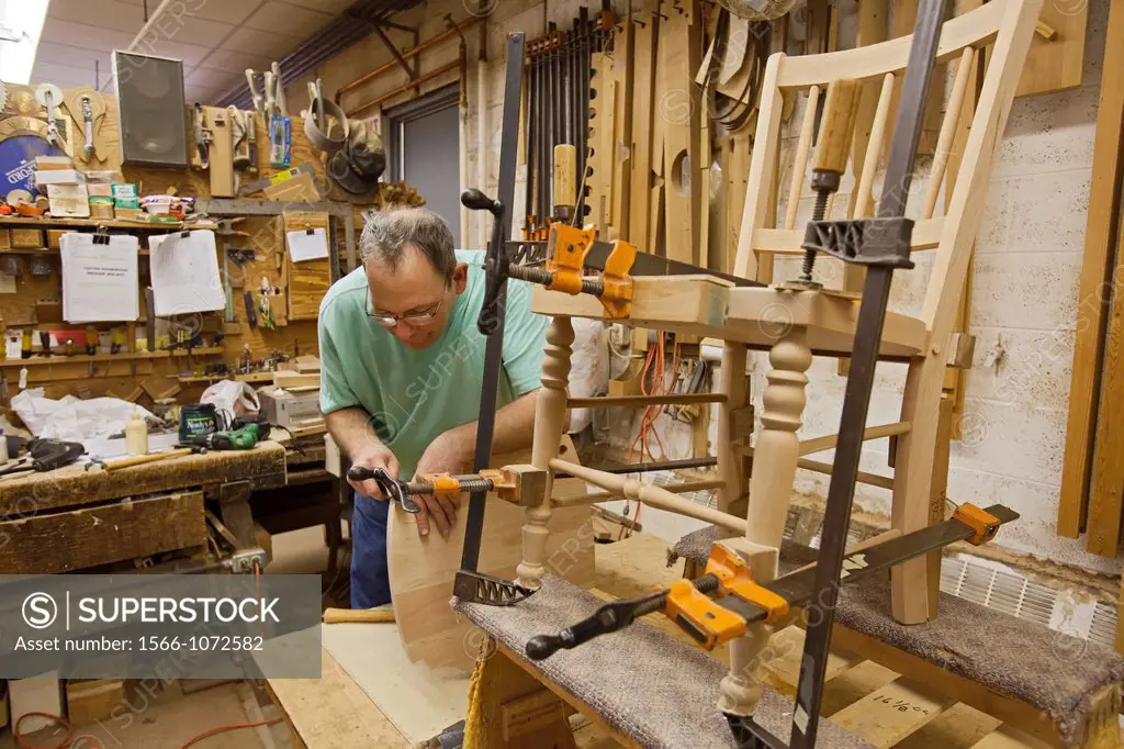 Amana, Iowa - A worker makes furniture at the Amana Furniture & Clock Shop   The shop is one of the enterprises started when German immigrants establi...