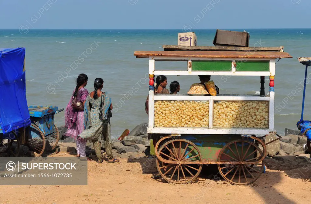 Indian women watching sea in Puducherry Pondichery,Tamil Nadu,South India,Asia