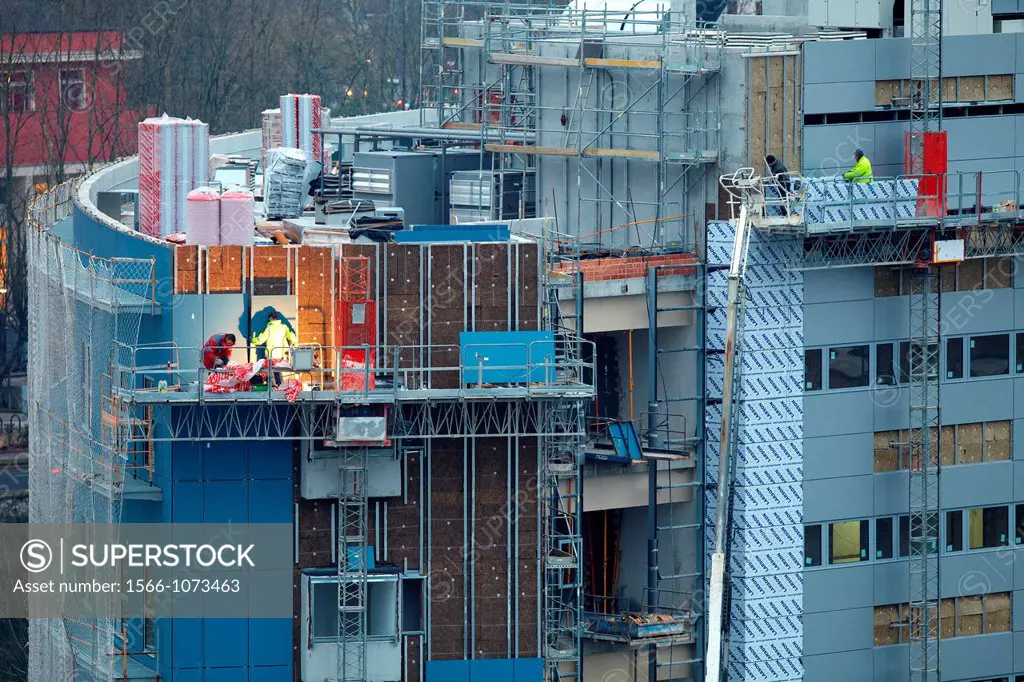 Placement of panels on the facade, building under construction, Donostia, San Sebastian, Gipuzkoa, Basque Country, Spain